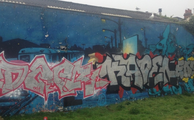 Repainting the Mural Wall in Stoneham Park, Hove