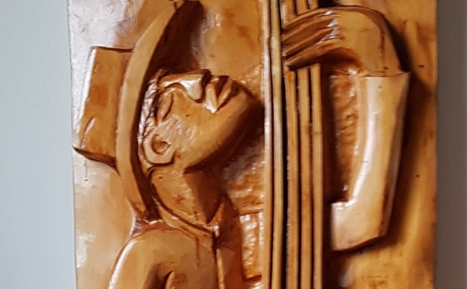 Chainsaw Sculpture sale for Mediterranean Refugees
