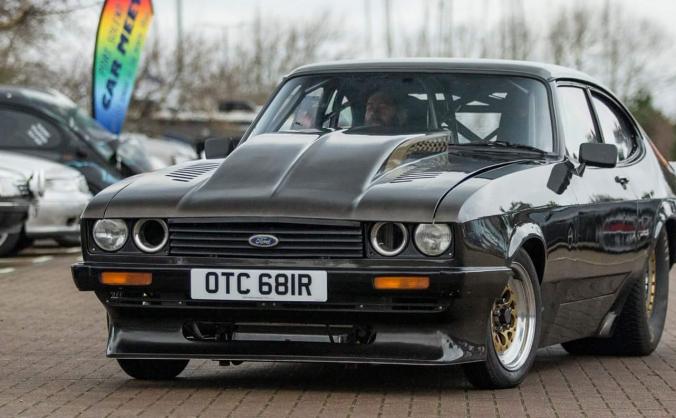 Triggers broom drag car.