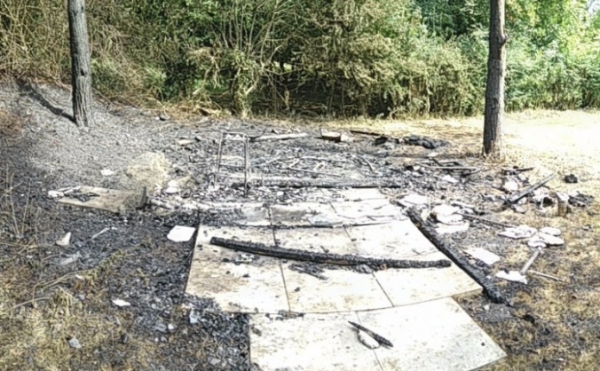 Burnt beekeeping shed