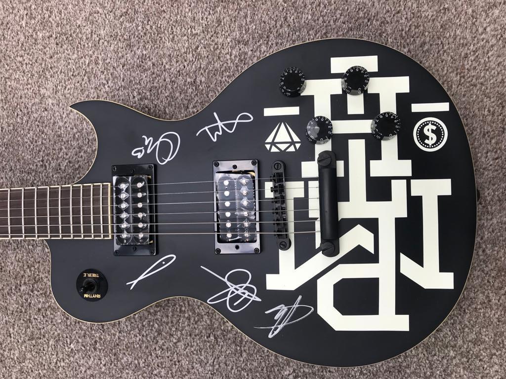 Win a signed Bring Me the Horizon Guitar - a Music crowdfunding