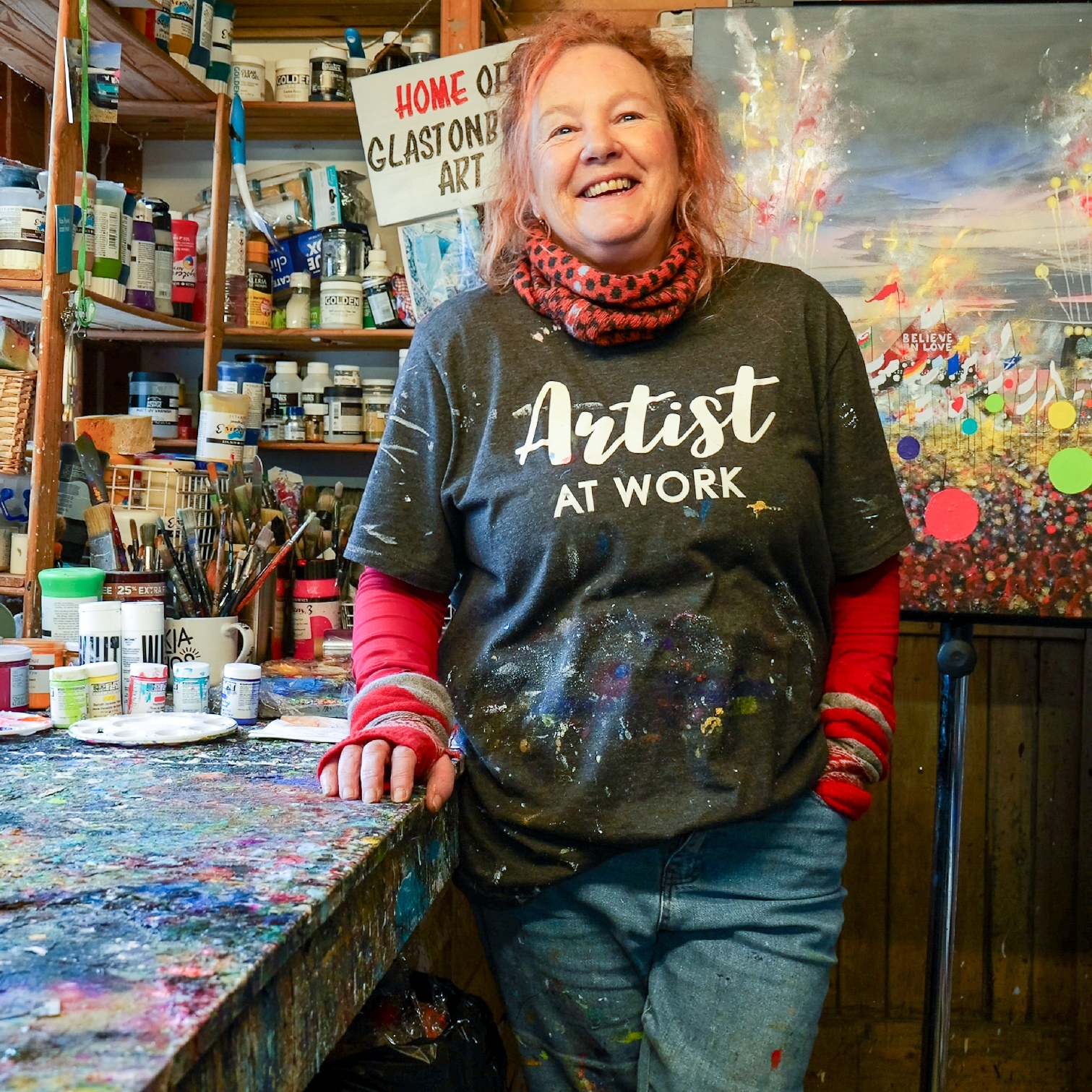 Alce Harfield painting Coldplay at Glastonbury - a Charities