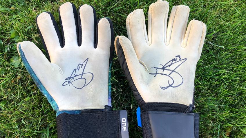 Win signed Jamie Jones match-worn gloves