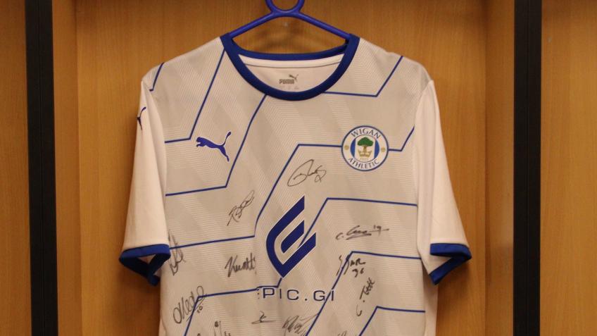 Win a signed 21/22 title winning third kit