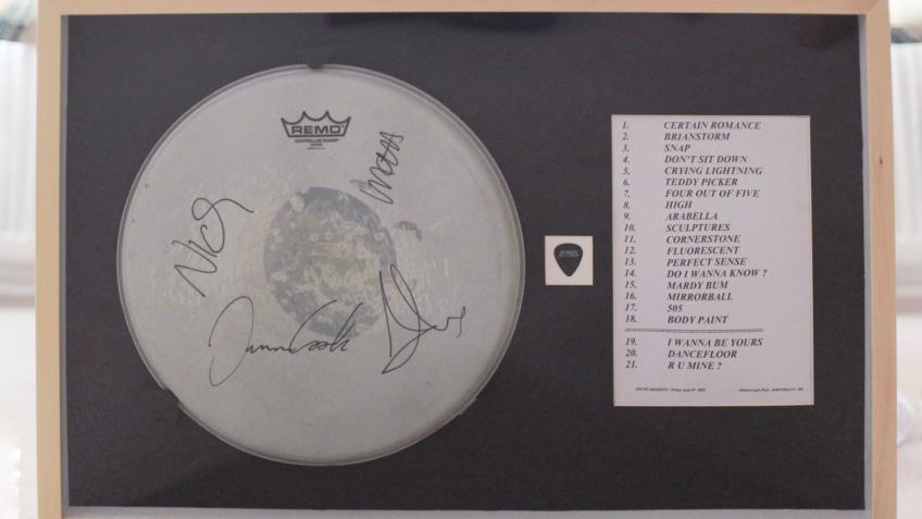 Win a signed Arctic Monkeys drum skin!