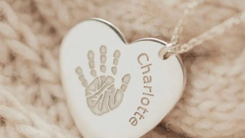 Silver handprint keepsakes for grieving children