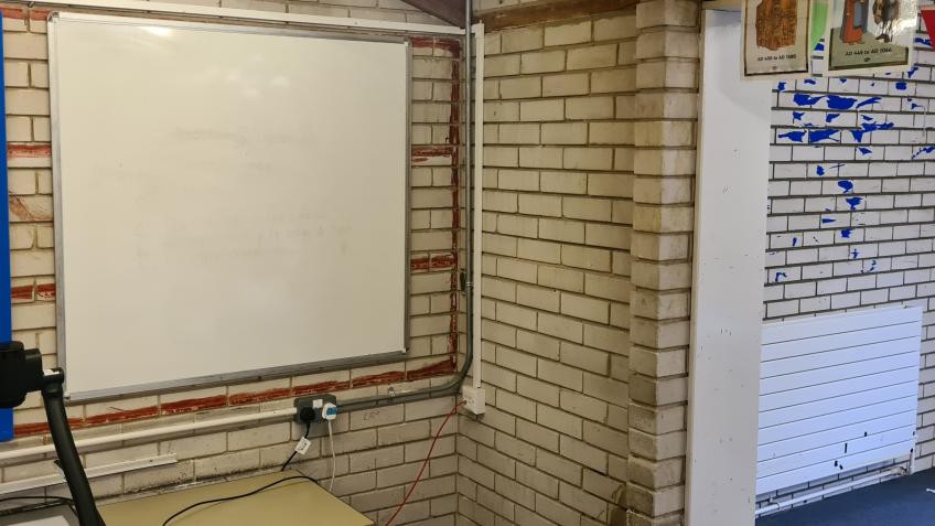 Painting a school in need
