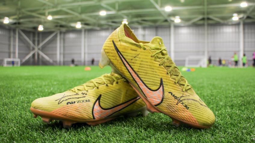 Win Tommy Watson's Signed Boots