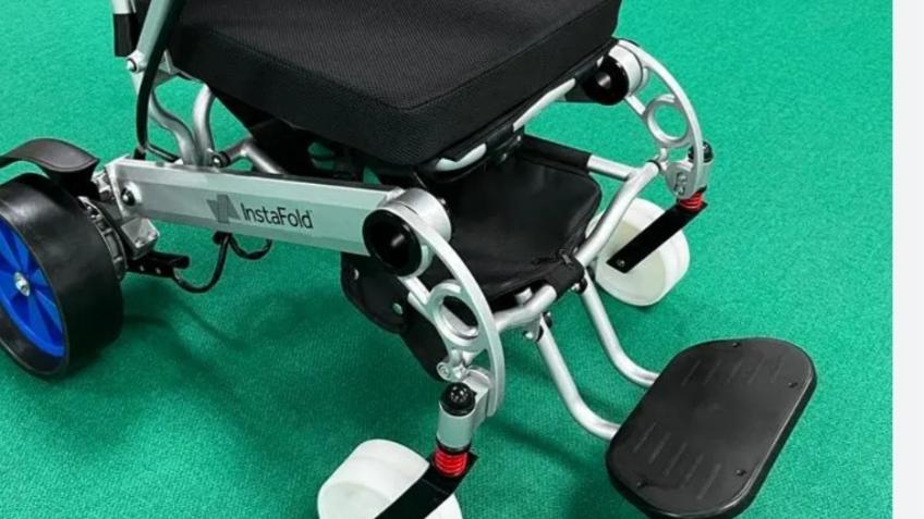 Flat green bowls powered wheelchair
