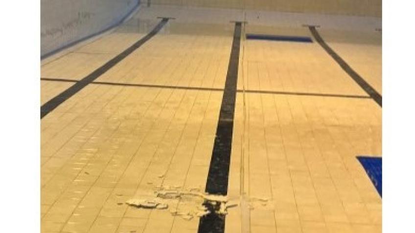 Repair pool tiles and replace expansion joints