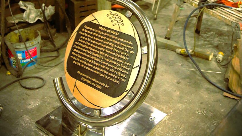 The Spinning Coins Statue