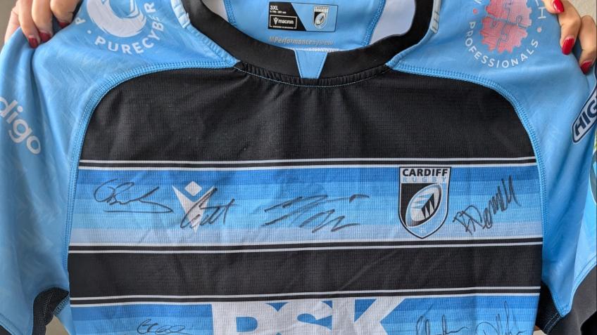 Win a signed Cardiff Rugby or Football shirt.