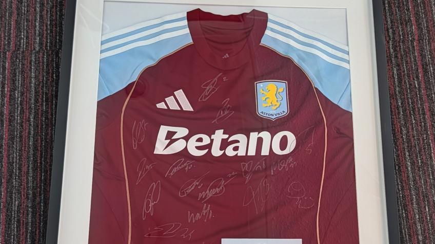 Signed Aston Villa home shirt in frame