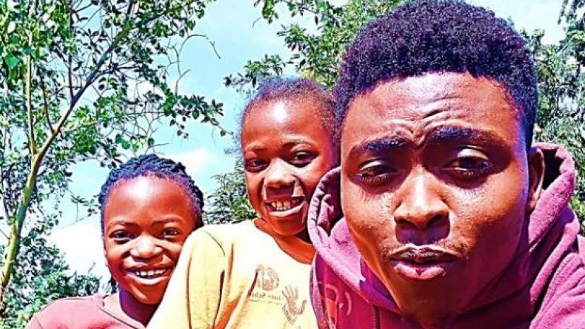 "In Africa" Music Video & Children's art training